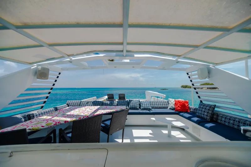 Island Time Yacht Photos Pics Luxurious 1991 Broward Motor Yacht with spacious deck and ocean view.