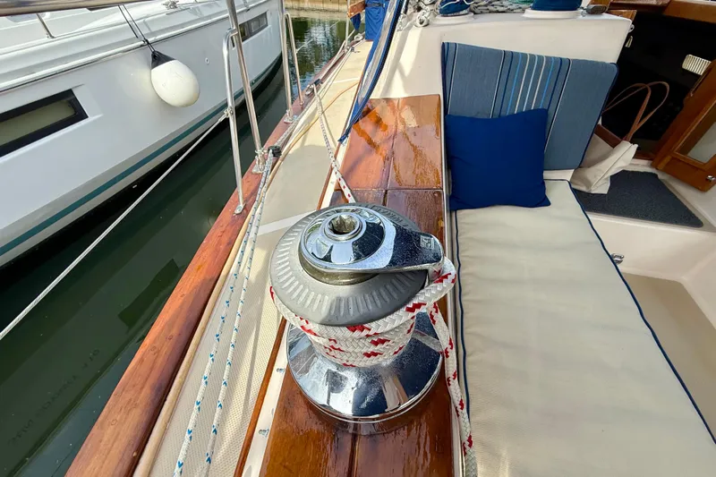 Blue Skies Yacht Photos Pics Deck of 1995 Island Packet 40 sailboat with winch and seating area.