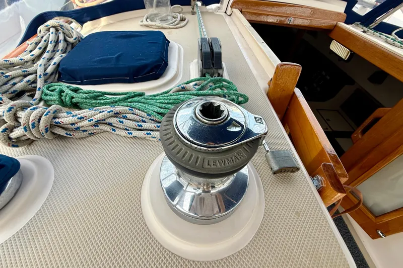 Blue Skies Yacht Photos Pics Deck of 1995 Island Packet 40 sailboat with winch and ropes.