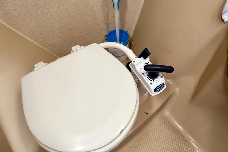 Blue Skies Yacht Photos Pics Marine toilet with manual pump on 1995 Island Packet 40 sailboat.