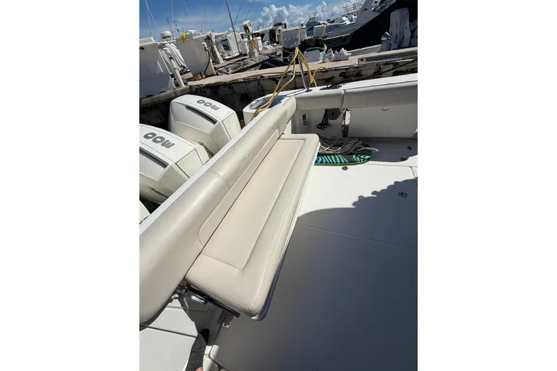  Yacht Photos Pics 2023 Boston Whaler 345 Conquest boat deck with seating and twin outboard engines.