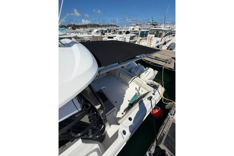  Yacht Photos Pics 2023 Boston Whaler 345 Conquest docked at marina, featuring sleek design and modern amenities.