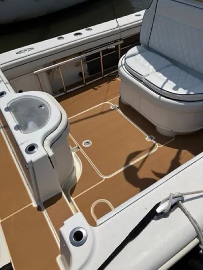  Yacht Photos Pics 2007 Yellowfin 36 boat deck with seating and fishing rod holders.