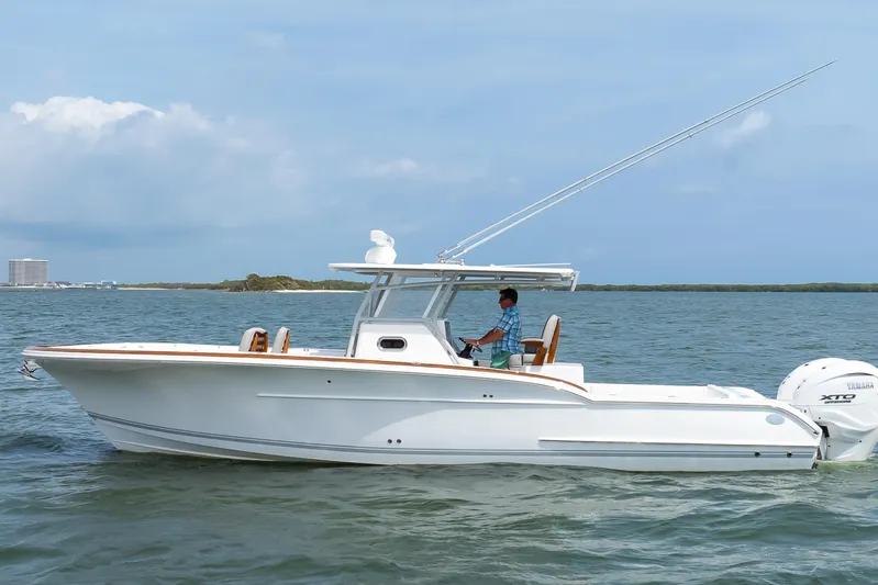  Yacht Photos Pics 2026 Buddy Davis 34 Center Console boat cruising on open water.