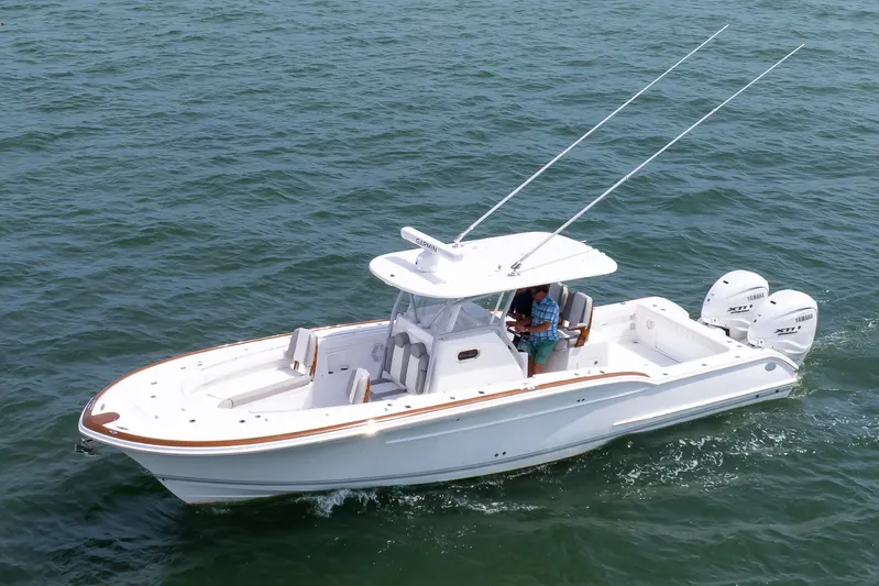  Yacht Photos Pics 2026 Buddy Davis 34 Center Console boat cruising on open water.