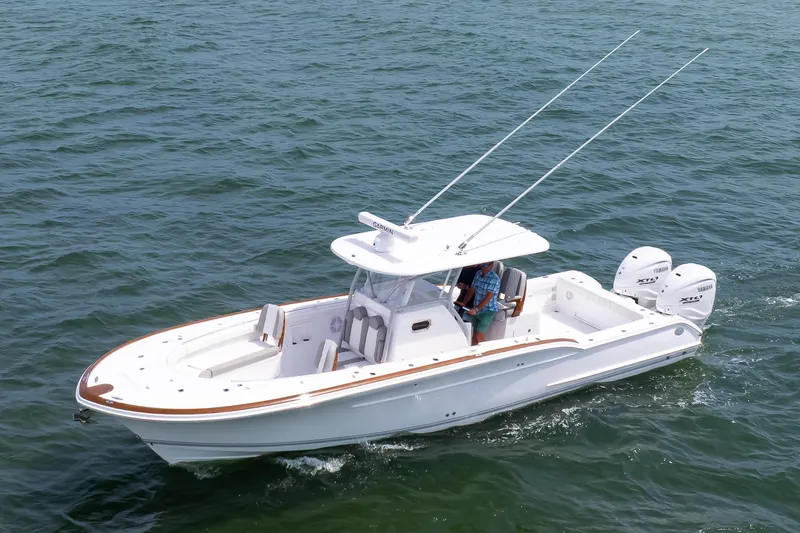  Yacht Photos Pics 2026 Buddy Davis 34 Center Console boat cruising on open water.