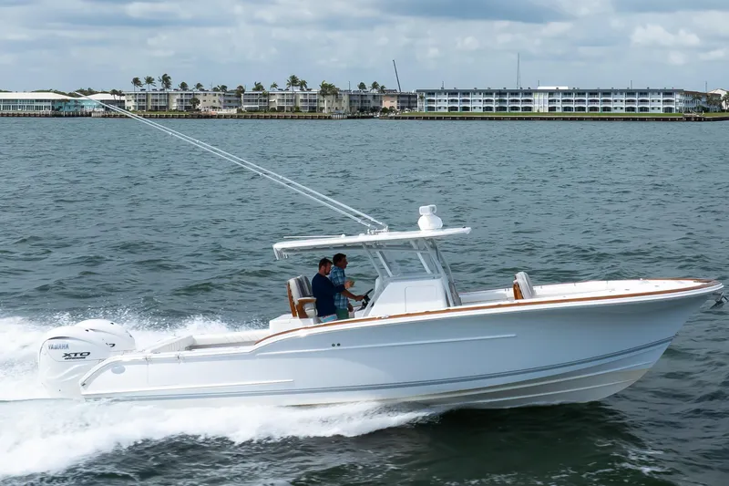  Yacht Photos Pics 2026 Buddy Davis 34 Center Console boat cruising on open water.