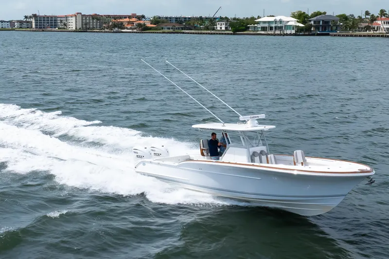  Yacht Photos Pics 2026 Buddy Davis 34 Center Console boat cruising on open water.