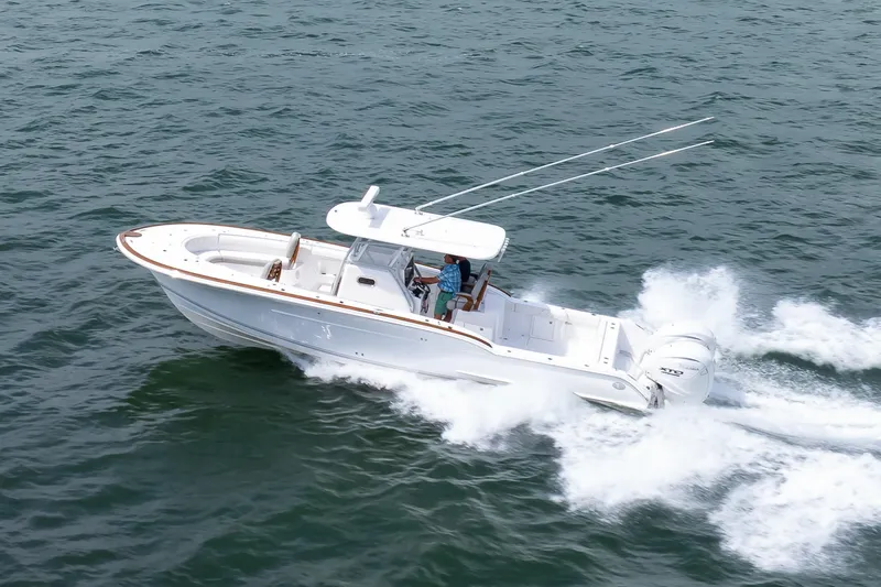  Yacht Photos Pics 2026 Buddy Davis 34 Center Console boat cruising on open water.