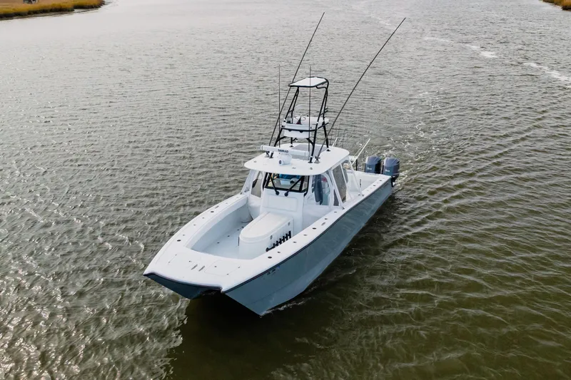  Yacht Photos Pics 2018 Freeman 37 VH boat cruising on a calm waterway.