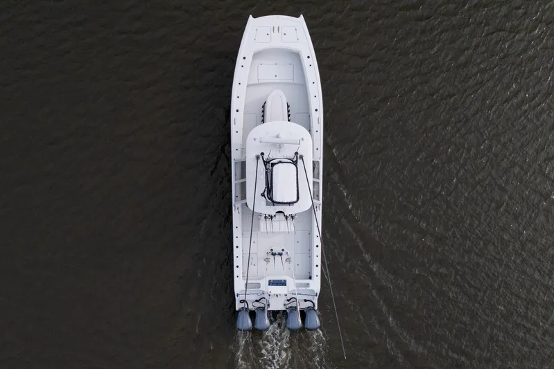  Yacht Photos Pics Aerial view of 2018 Freeman 37 VH boat cruising on water.