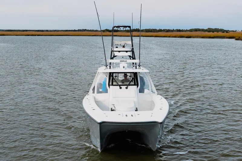  Yacht Photos Pics 2018 Freeman 37 VH boat cruising on calm water, front view.