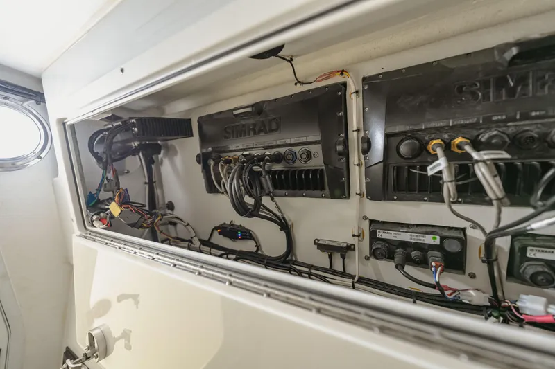  Yacht Photos Pics Electrical panel inside a 2018 Freeman 37 VH boat, featuring Simrad equipment and wiring.