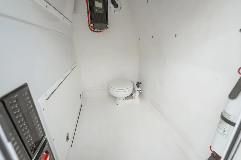  Yacht Photos Pics Interior of a 2018 Freeman 37 VH boat featuring a compact marine toilet.