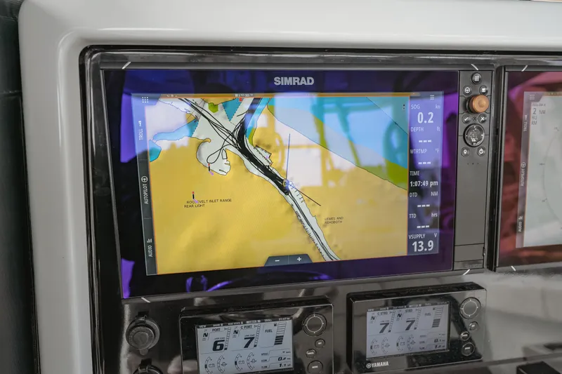  Yacht Photos Pics Simrad navigation display on a 2018 Freeman 37 VH boat, showing nautical chart and data.