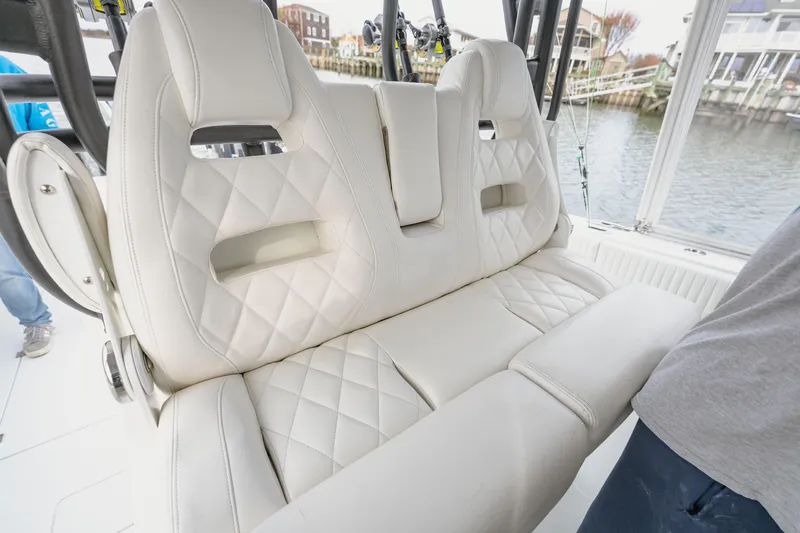  Yacht Photos Pics Luxurious white leather seating on a 2018 Freeman 37 VH boat interior.