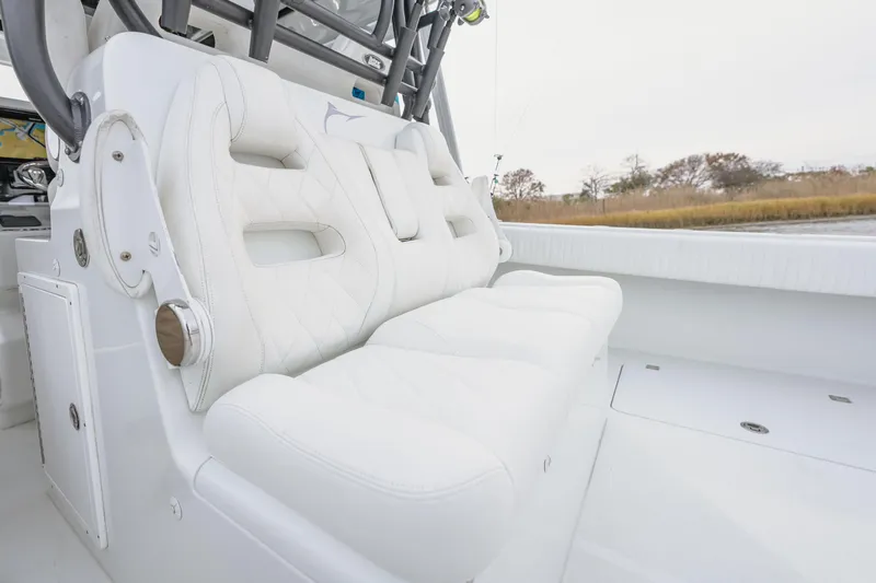  Yacht Photos Pics Luxurious white seating on a 2018 Freeman 37 VH boat, showcasing comfort and style.