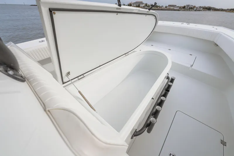 Yacht Photos Pics Open storage compartment on 2018 Freeman 37 VH boat, near water.