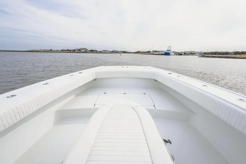  Yacht Photos Pics 2018 Freeman 37 VH boat on calm water, showcasing spacious deck and sleek design.