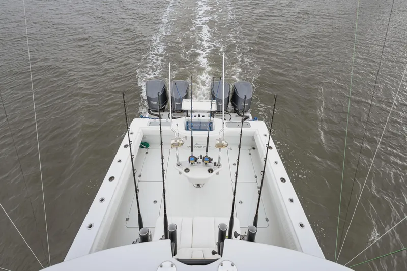  Yacht Photos Pics Aerial view of 2018 Freeman 37 VH boat with fishing rods and dual engines.