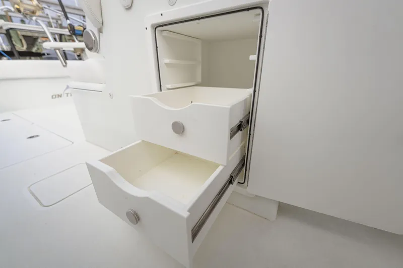  Yacht Photos Pics Open storage drawers on a 2018 Freeman 37 VH boat interior.