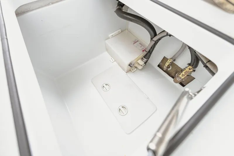  Yacht Photos Pics 2018 Freeman 37 VH boat compartment with hoses and fittings.