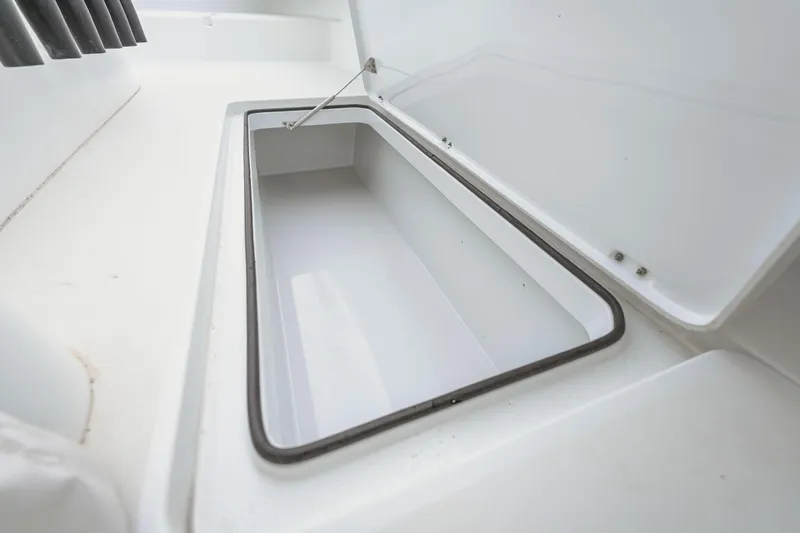  Yacht Photos Pics Open storage compartment on a 2018 Freeman 37 VH boat, showcasing interior space.