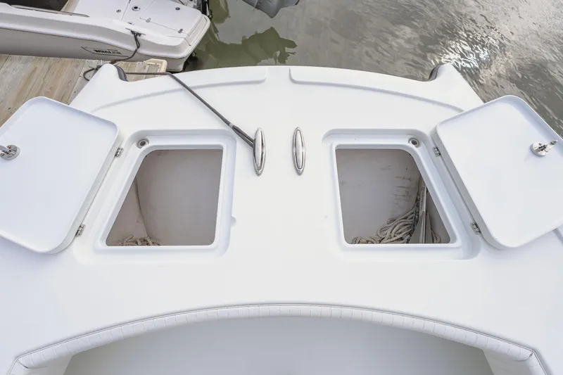  Yacht Photos Pics Open storage compartments on a 2018 Freeman 37 VH boat deck.