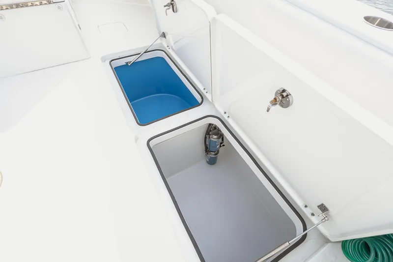  Yacht Photos Pics Open storage compartments on a 2018 Freeman 37 VH boat deck.