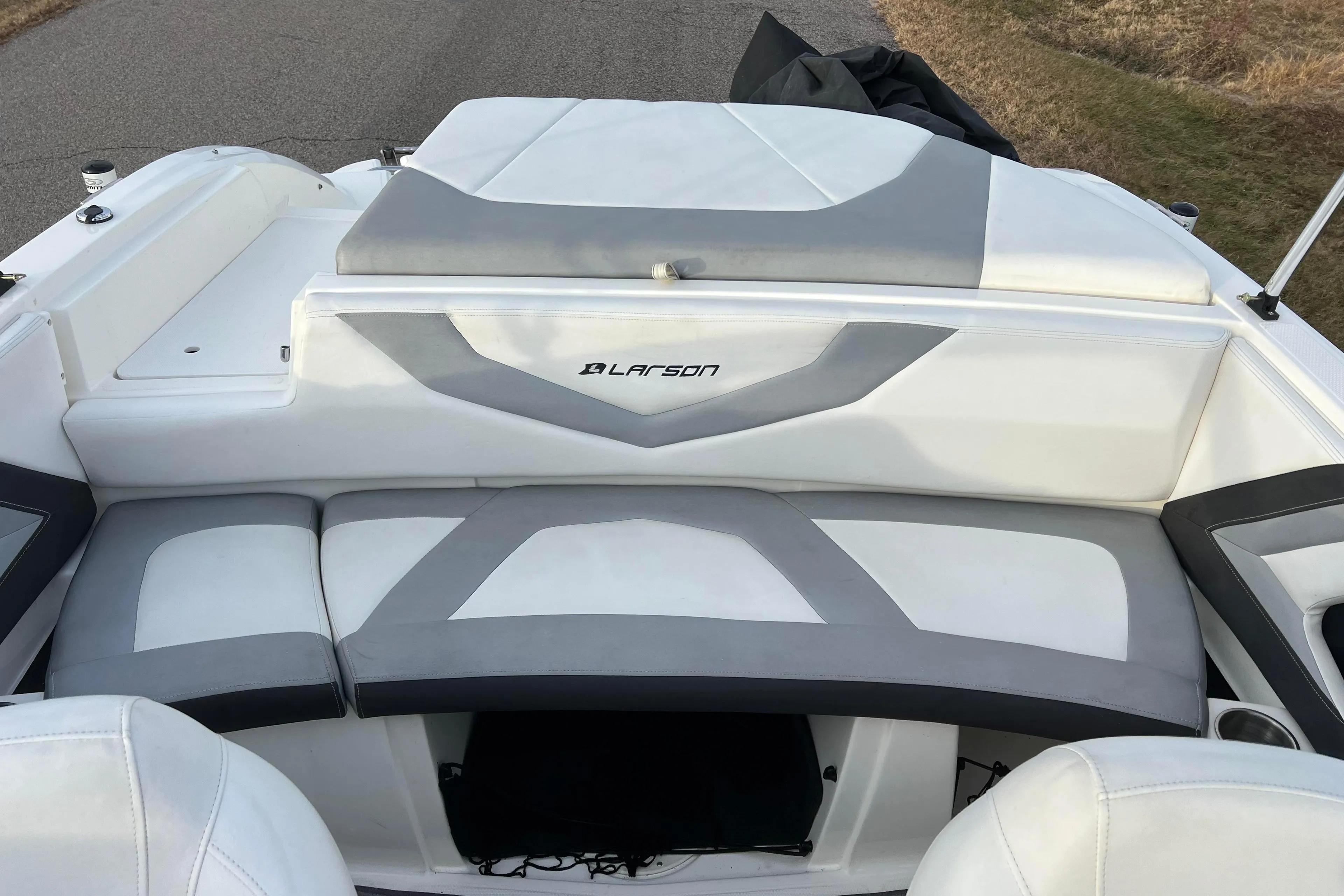 2013 Larson LX 205S IO boat interior with white and gray seating.