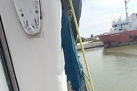  Yacht Photos Pics Offshore Fast Crew Taxi Catamaran by Mützelfeldtwerft, 2016, docked near a red vessel.