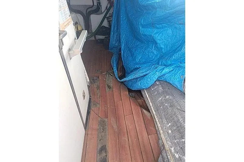  Yacht Photos Pics Interior of 2016 Mützelfeldtwerft Offshore Fast Crew Taxi Catamaran with wooden flooring.