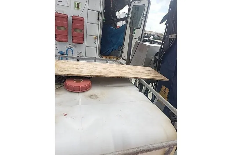  Yacht Photos Pics 2016 Mützelfeldtwerft Offshore Fast Crew Taxi Catamaran interior with equipment and safety gear.