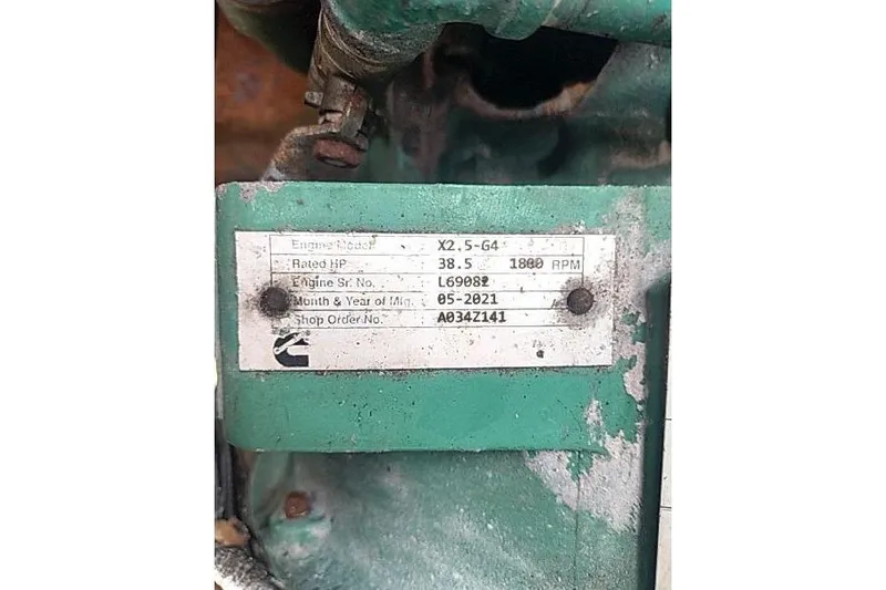  Yacht Photos Pics Engine label on Mützelfeldtwerft Offshore Fast Crew Taxi Catamaran, 2016 model, showing specifications.