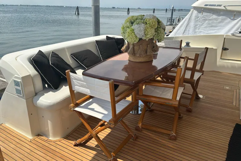  Yacht Photos Pics Luxurious 2008 Azimut Fly 68 yacht deck with elegant seating and ocean view.