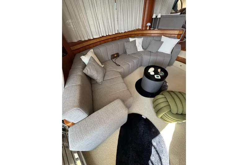  Yacht Photos Pics Luxurious interior of 2008 Azimut Fly 68 yacht with plush gray seating and modern decor.