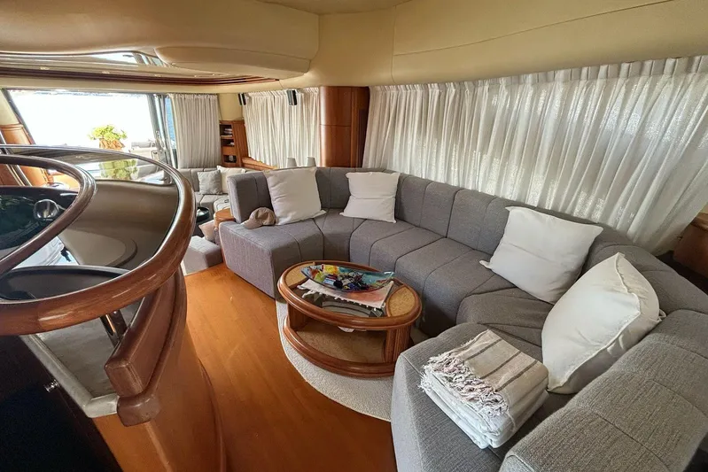  Yacht Photos Pics Luxurious interior of 2008 Azimut Fly 68 yacht with plush seating and elegant decor.