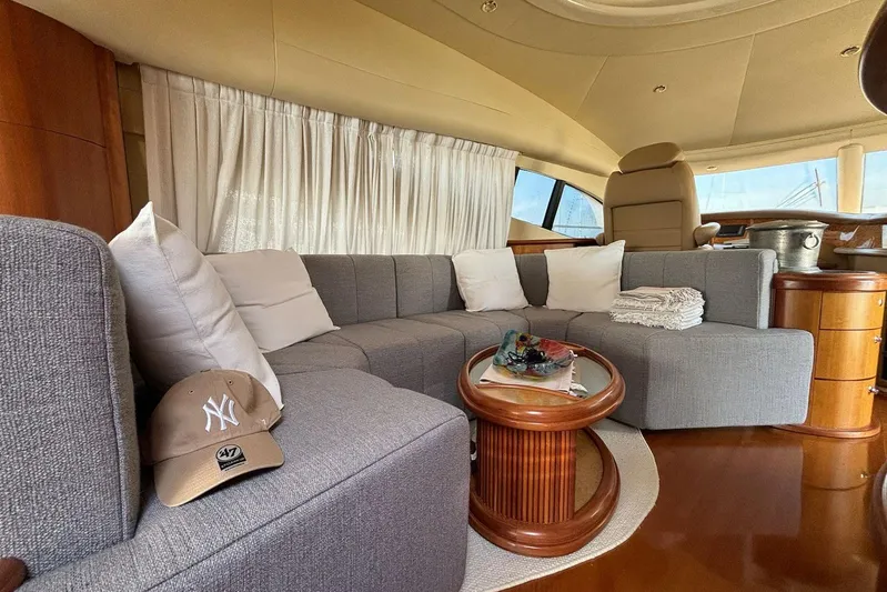  Yacht Photos Pics Luxurious interior of 2008 Azimut Fly 68 yacht with plush seating and elegant decor.