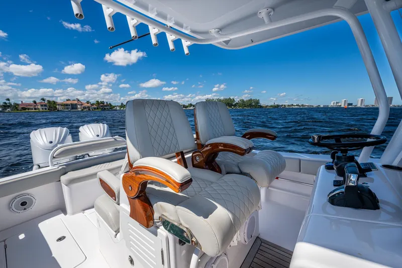  Yacht Photos Pics 2022 Jupiter 32 boat interior with luxurious seating and ocean view.