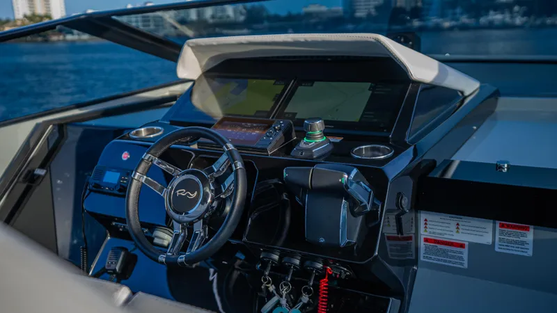  Yacht Photos Pics 2024 Rio Yachts Daytona 50 helm with modern controls and sleek design.