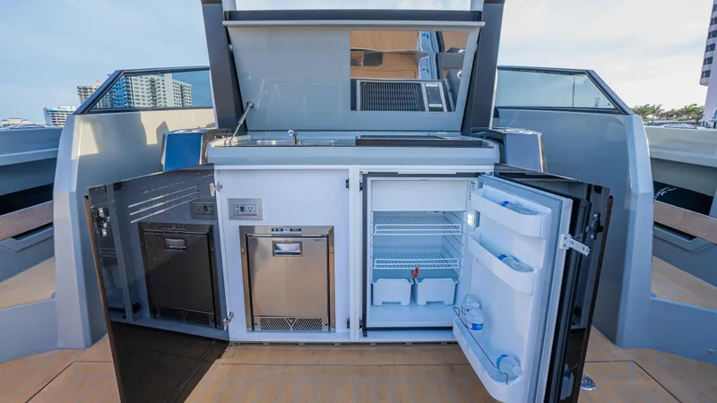  Yacht Photos Pics Outdoor kitchen on 2024 Rio Yachts Daytona 50, featuring fridge and storage.
