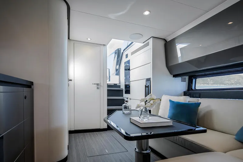  Yacht Photos Pics Luxurious interior of 2025 Azimut Verve 48 yacht with modern seating and decor.