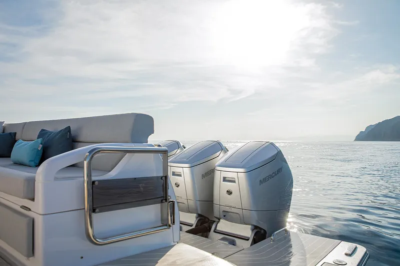  Yacht Photos Pics Azimut Verve 48 yacht, 2025 model, with twin Mercury outboard engines on a sunny day.