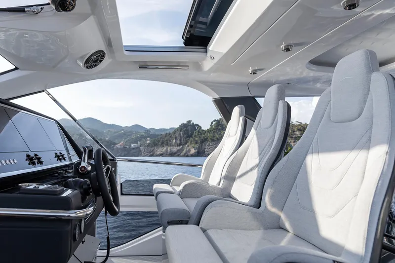  Yacht Photos Pics Interior of 2025 Azimut Verve 48 yacht with luxurious seating and scenic ocean view.