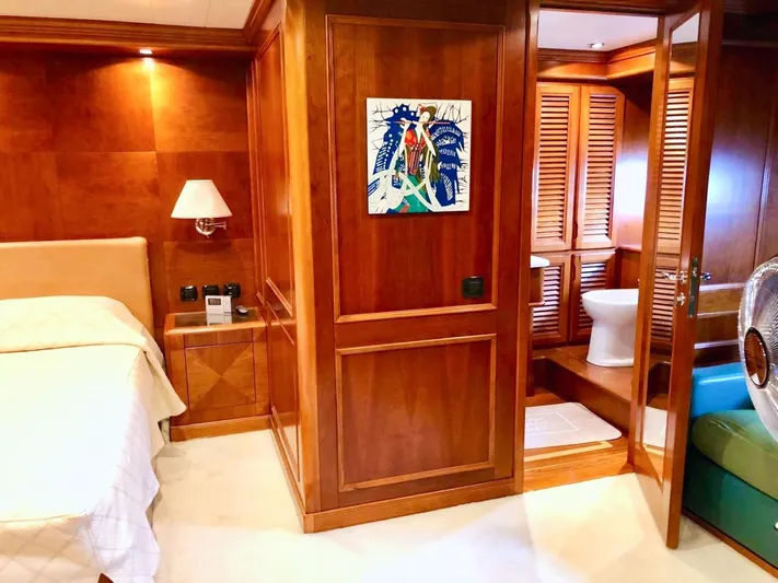 Annamia Yacht Photos Pics Luxurious Terranova Yachts T85 2007 cabin with elegant wood paneling and modern amenities.