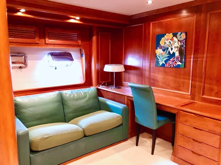 Annamia Yacht Photos Pics Luxurious Terranova Yachts T85 interior, featuring elegant wood paneling and comfortable seating, 2007 model.