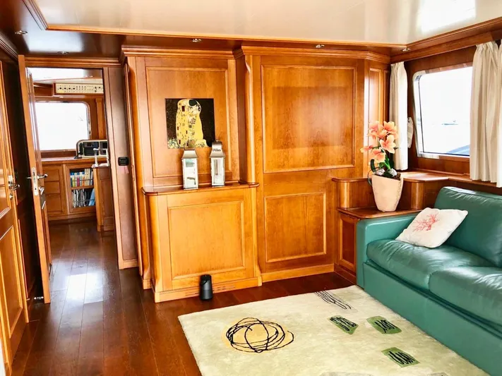 Annamia Yacht Photos Pics Luxurious interior of 2007 Terranova Yachts T85 with wood paneling and elegant decor.