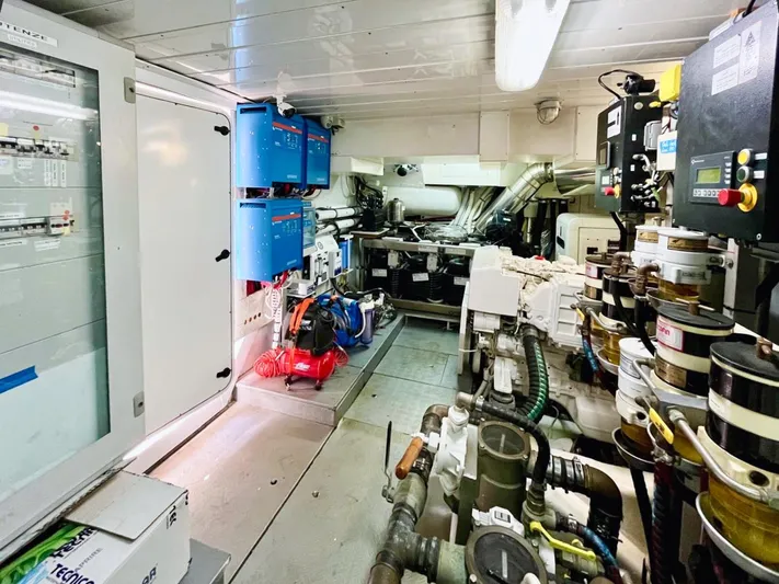 Annamia Yacht Photos Pics Engine room of 2007 Terranova Yachts T85, showcasing machinery and control panels.