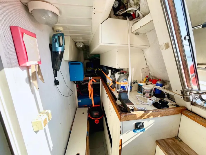 Annamia Yacht Photos Pics Interior view of 2007 Terranova Yachts T85, featuring storage and maintenance area.
