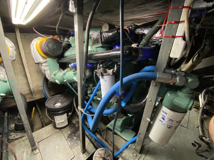  Yacht Photos Pics Engine room of 1982 Bertram 46.6 War Wagon with visible machinery and components.